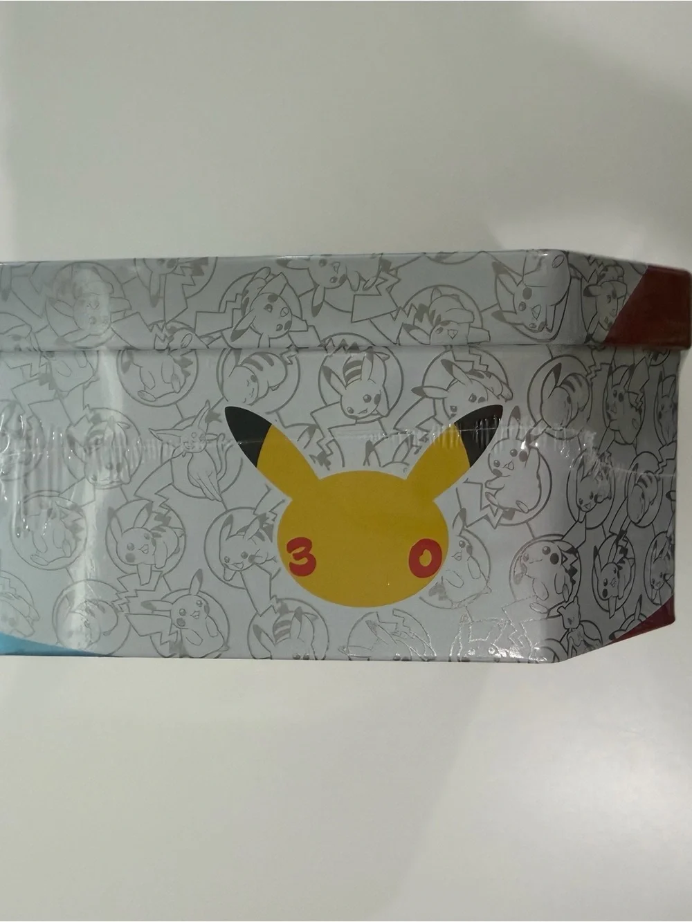 Brand New 30th Celebration Pokémon Tin